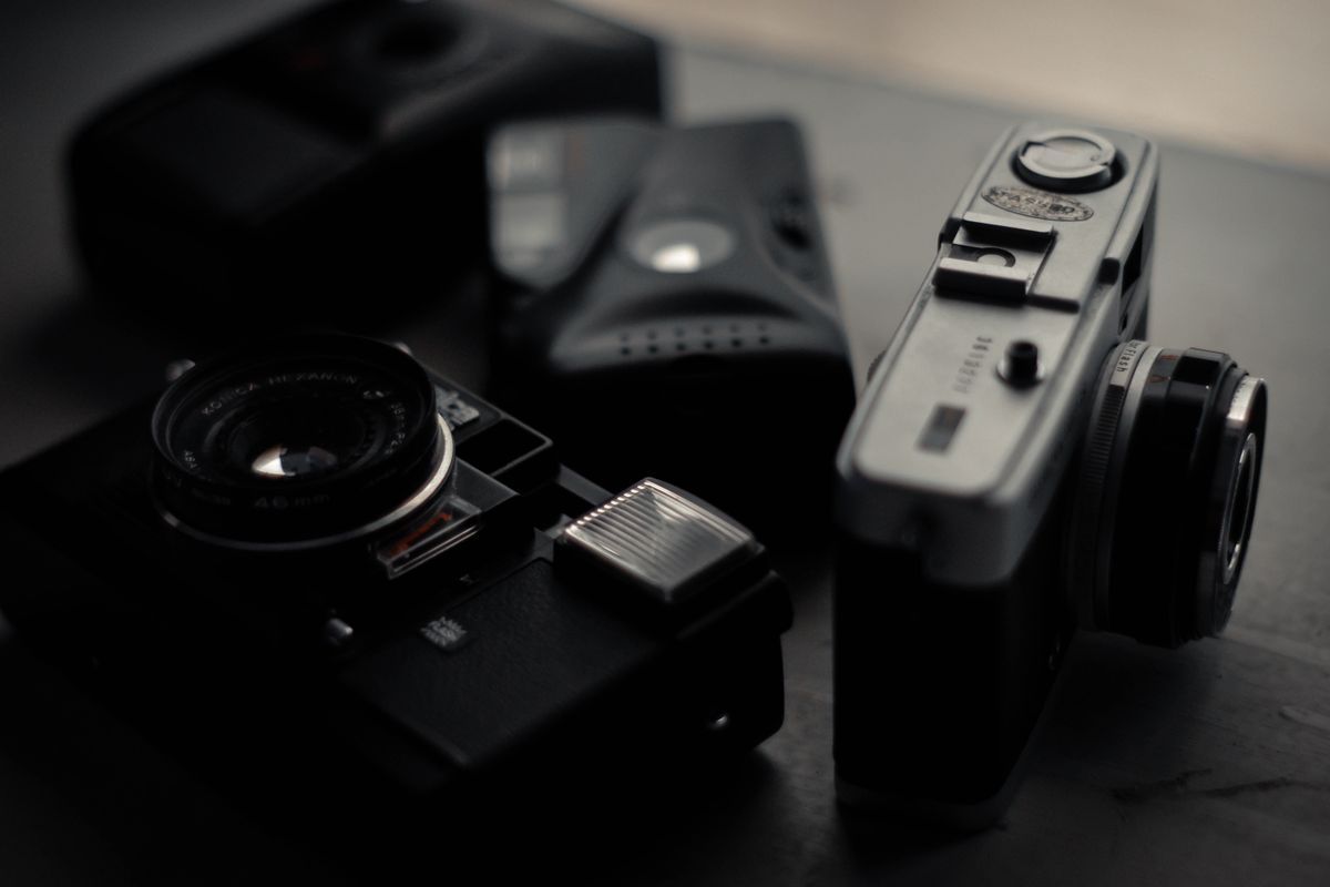 Professional camera collection on a desk