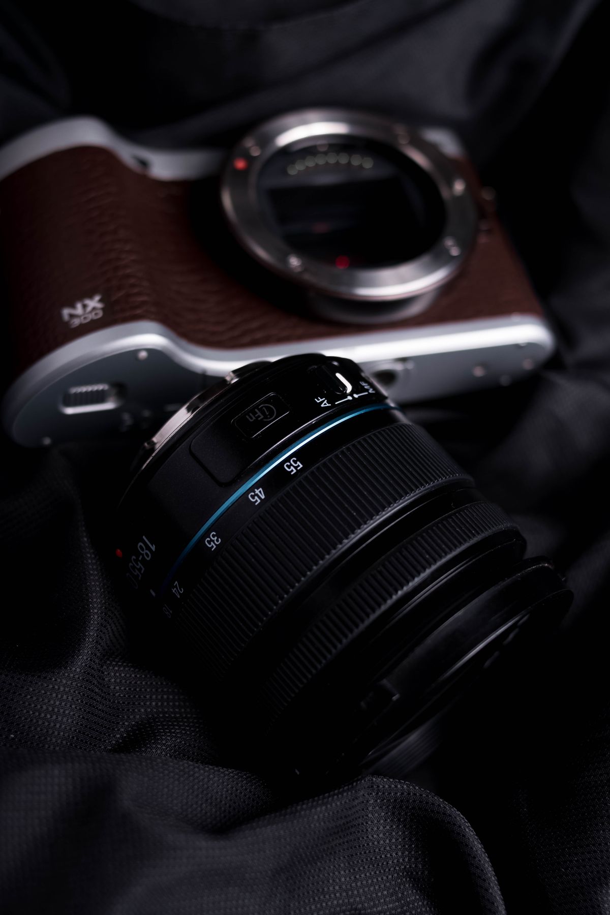 DSLR camera and lens on a dark background