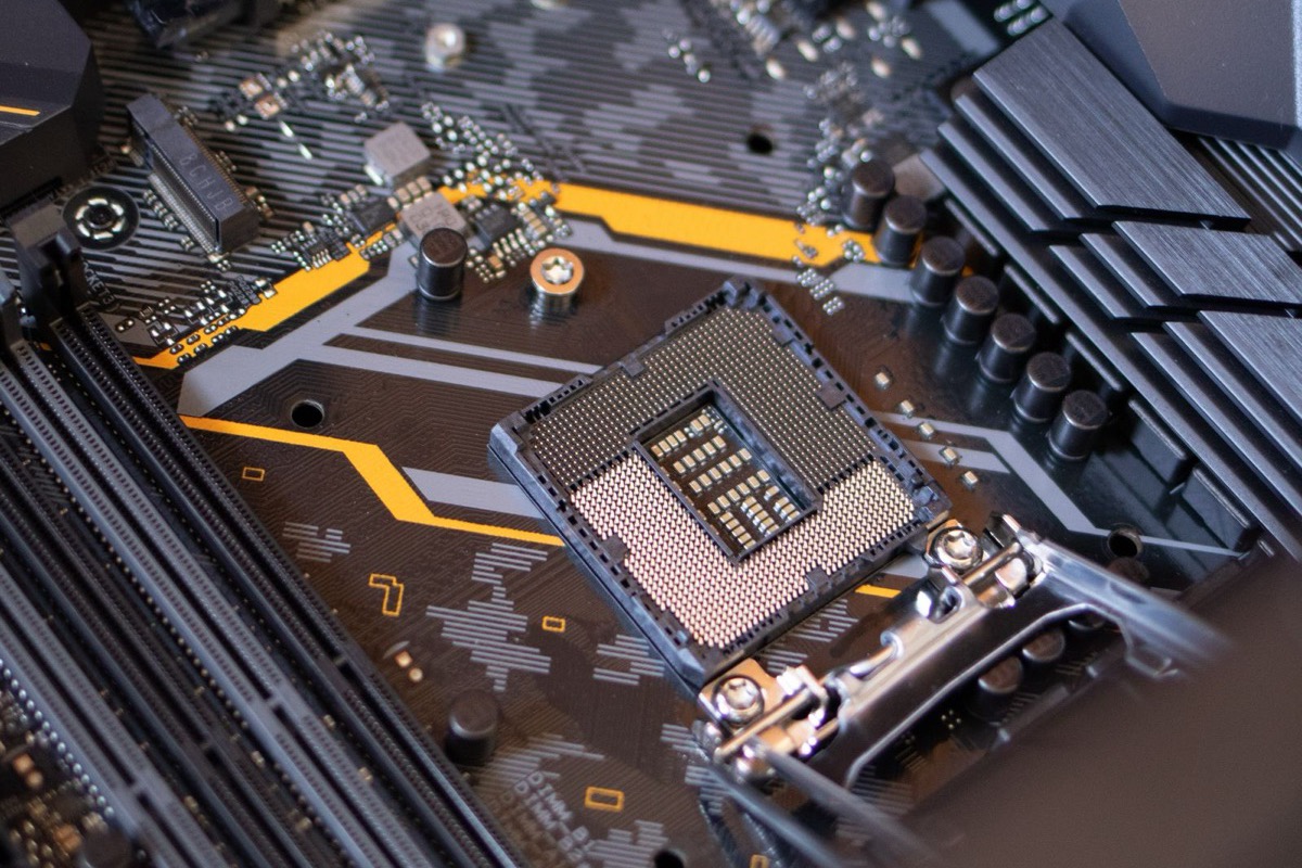 Close-up of a motherboard with a CPU socket and RAM slots, illustrating the hardware needed to self-host a large open model