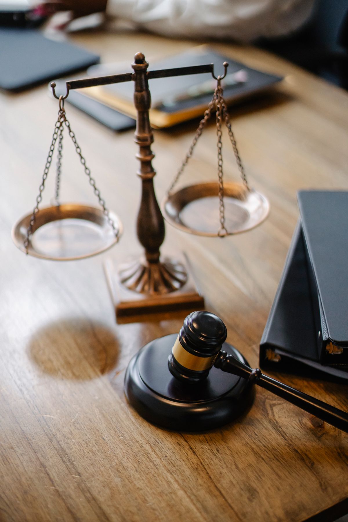 Scales of justice and a wooden gavel — symbols of law