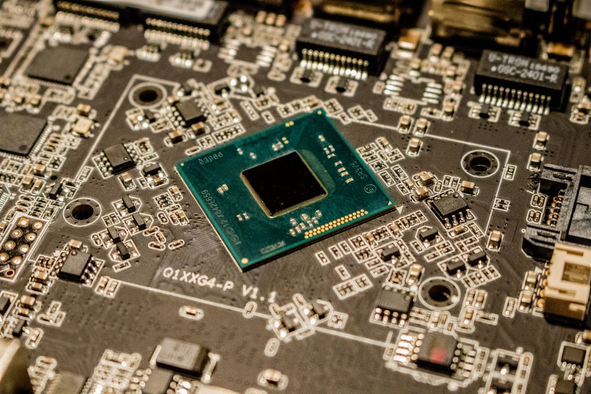Close-up of a microchip on an electronic circuit board