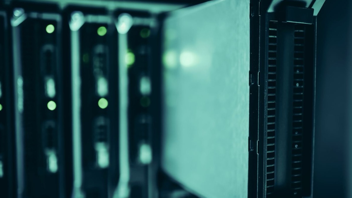 Row of blade servers in an internal data center, illustrating a sovereign LLM running behind the corporate firewall